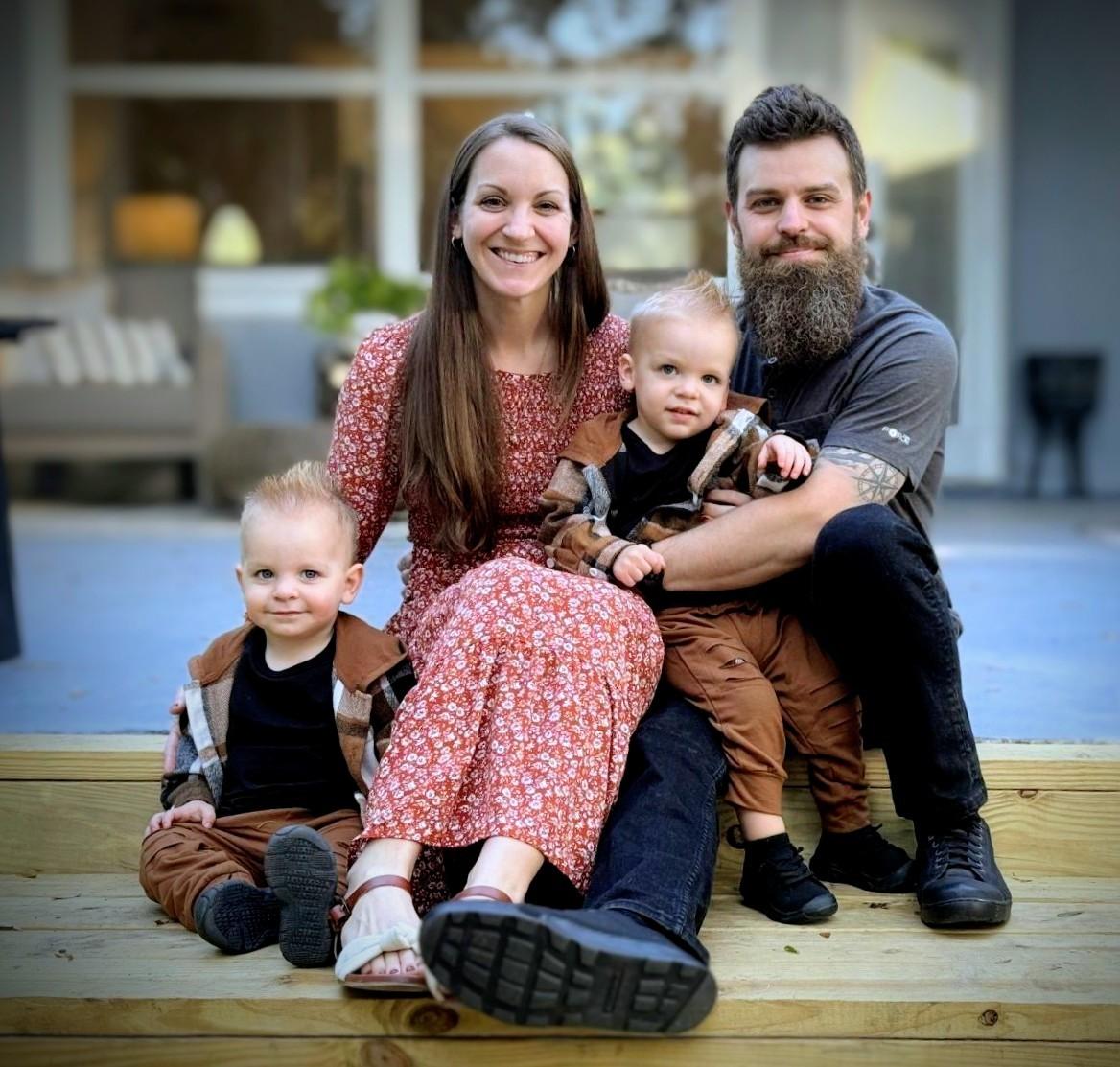 JR Robbins, owner of Freedom Lawn Pros, on a freshly maintained lawn in Central Florida