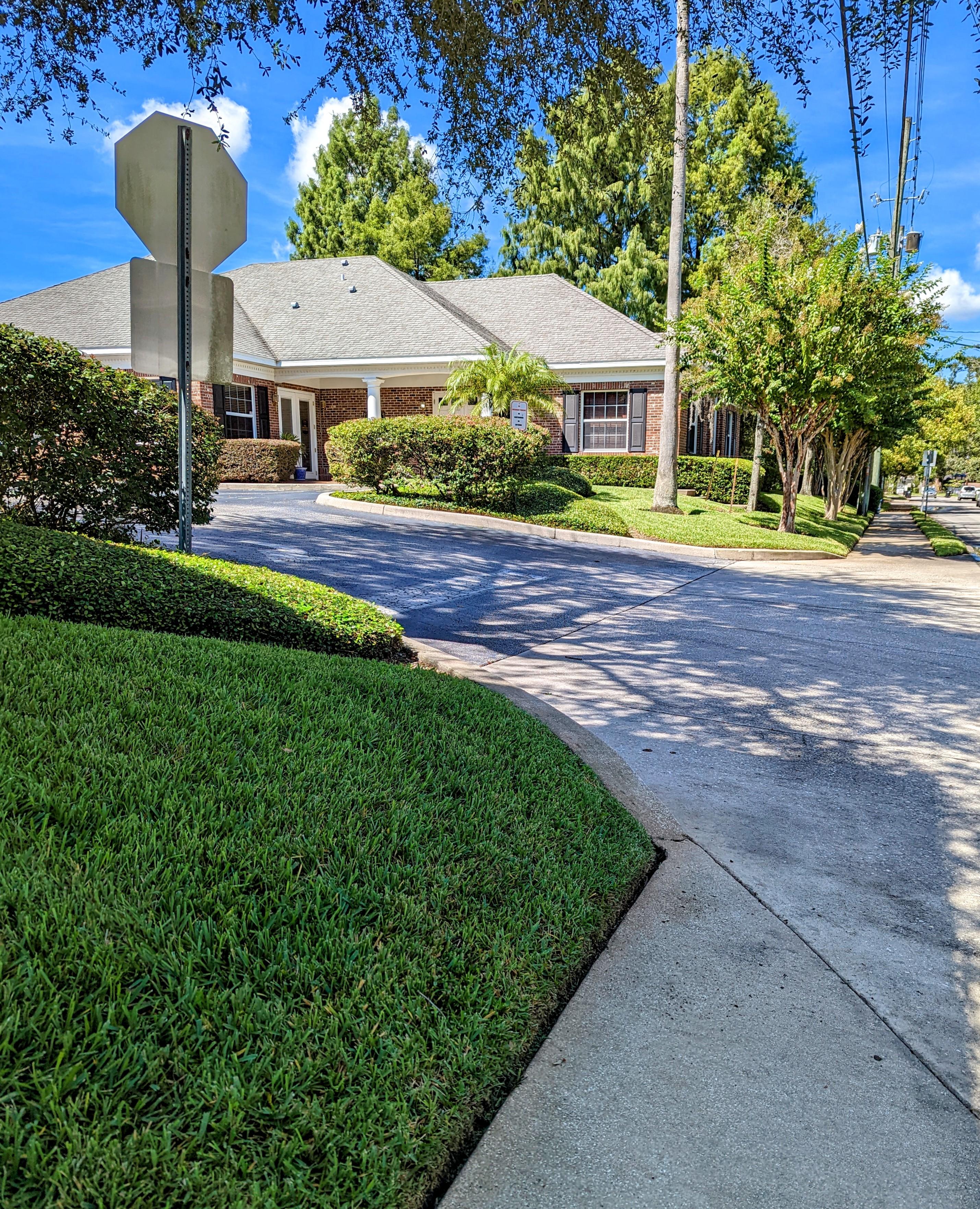 Professional commercial lawn care and curb appeal in Winter Park, FL - clean grass and sharp edging